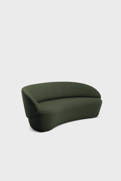 Green Naïve Sofa by Aquamarine Poppy featuring a modern design with plush cushions and sleek wooden legs.
