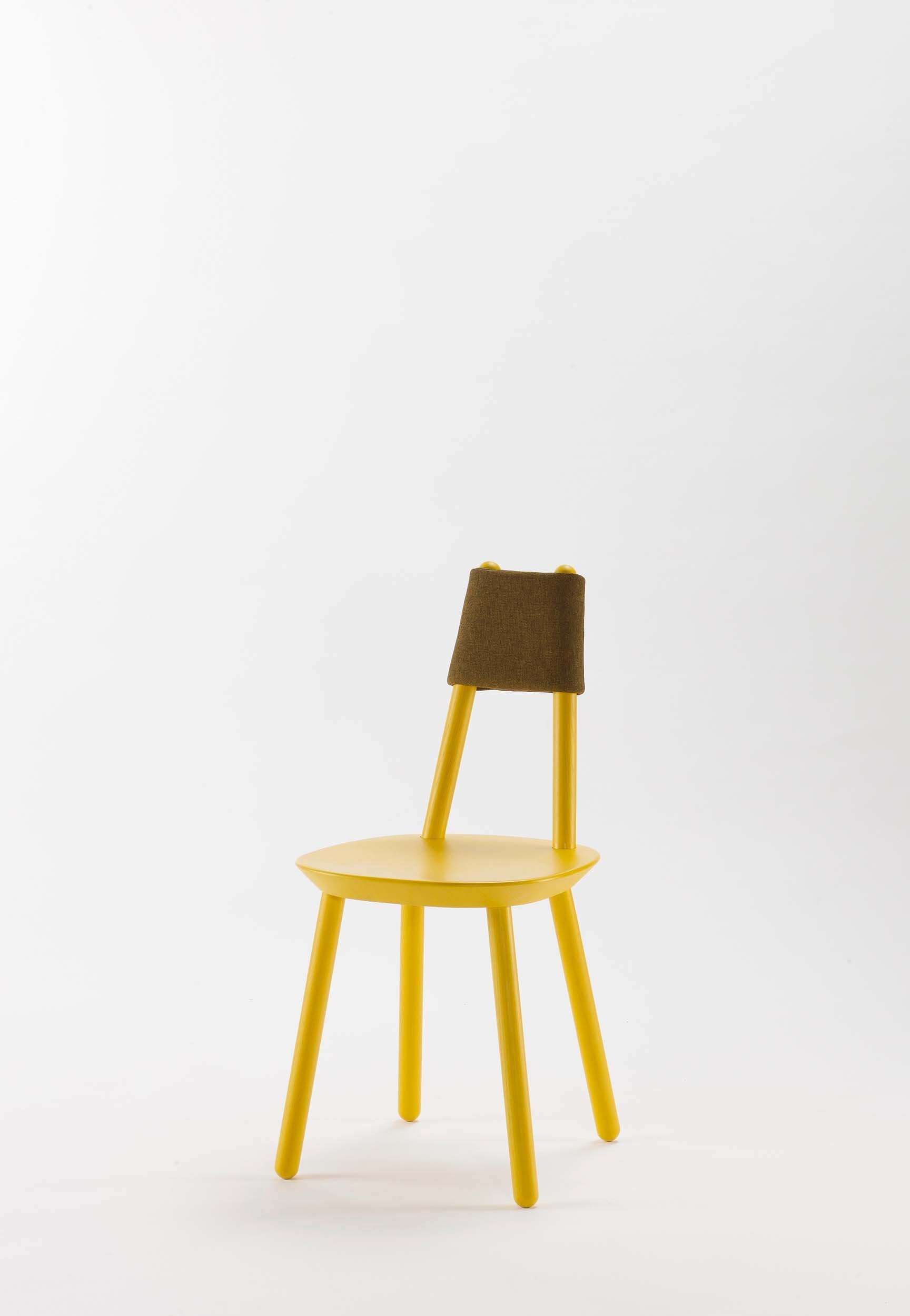 Yellow Naïve Dining Chair by Aquamarine Poppy, showcasing modern furniture with a sleek, ergonomic design.