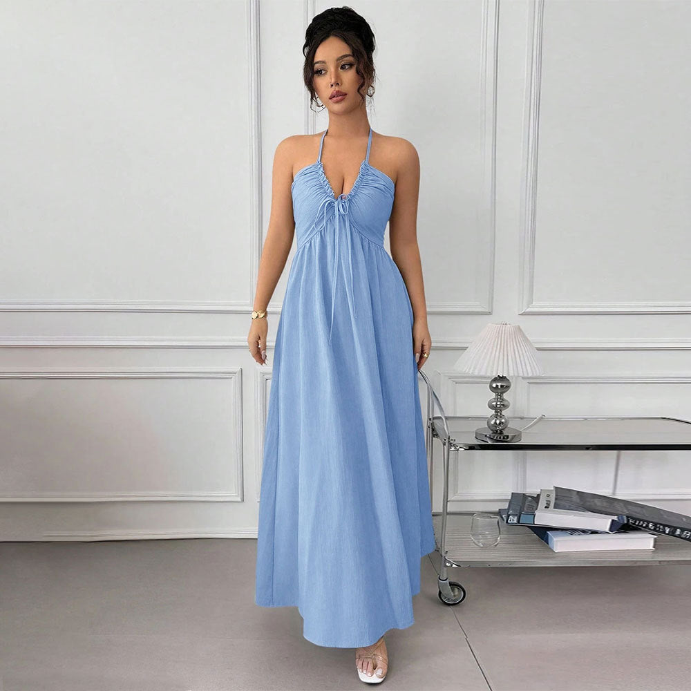 Blue halter backless summer dress with lace-up waist and seaside style, by Pear Daisy, perfect for warm weather.