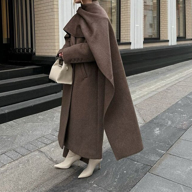 Carmine Juneberry Urban Drape Wool Coat, stylish 25 Edition, in neutral fabric, front view showcasing classic jacket design.
