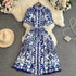 Women’s short sleeve printed beach holiday dress by Pear Daisy, lightweight summer dress with vibrant floral print.
