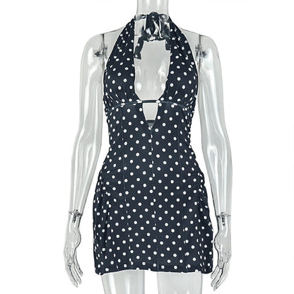 Polka dot slimming A-line dress by Pear Daisy featuring a deep V plunge neckline and printed design.
