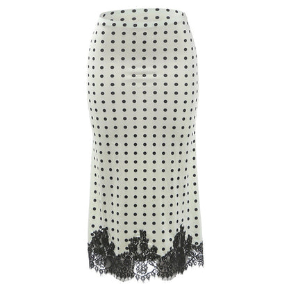 Fashionable women’s summer polka dot lace dress by Pear Daisy, perfect for casual wear and versatile home and garden outings.