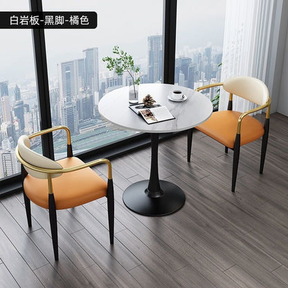 A light luxury sintered stone small round table for reception and negotiation tables and chairs, a trendy coffee table, balcony lounge table, and chair combination