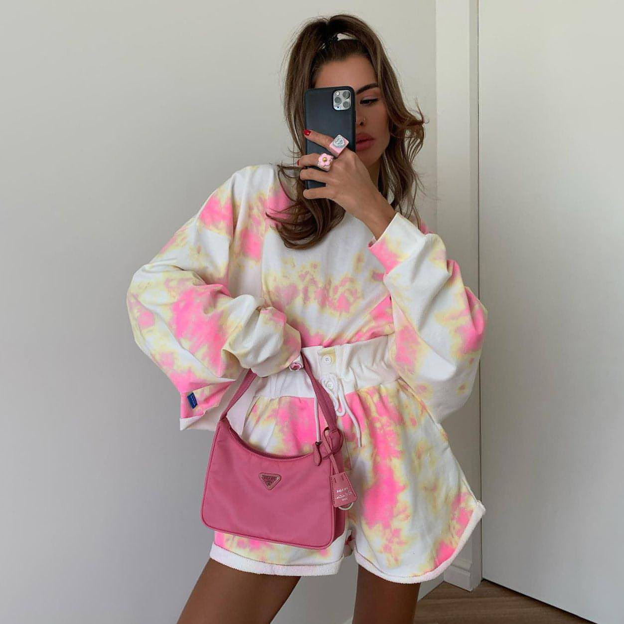 Tie-dye lace-up shorts and matching top set for women from Carmine Juneberry, casual two-piece outfit with vibrant pattern.