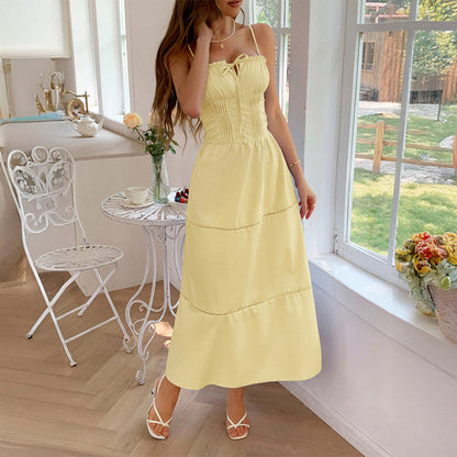 Pear Daisy casual vacation sling maxi dress for women, perfect for spring and summer, displayed on a model in a bright outdoor setting.