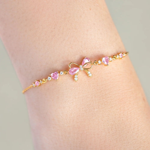Rose Sand Brier love bow bracelet for women featuring a delicate love bow design on a stylish bracelet.
