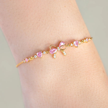 Rose Sand Brier love bow bracelet for women featuring a delicate love bow design on a stylish bracelet.
