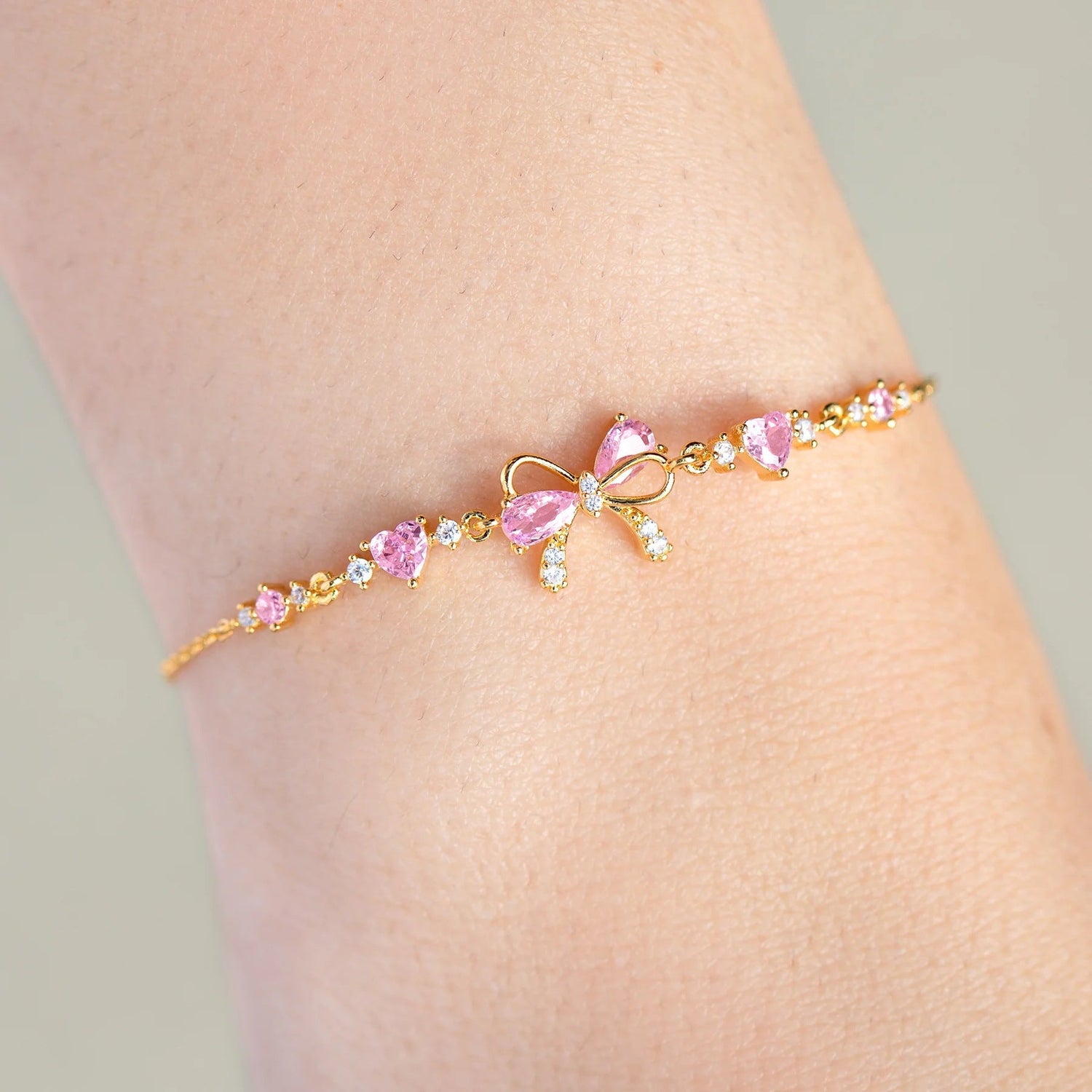 Rose Sand Brier love bow bracelet for women featuring a delicate bow design and elegant jewelry style.