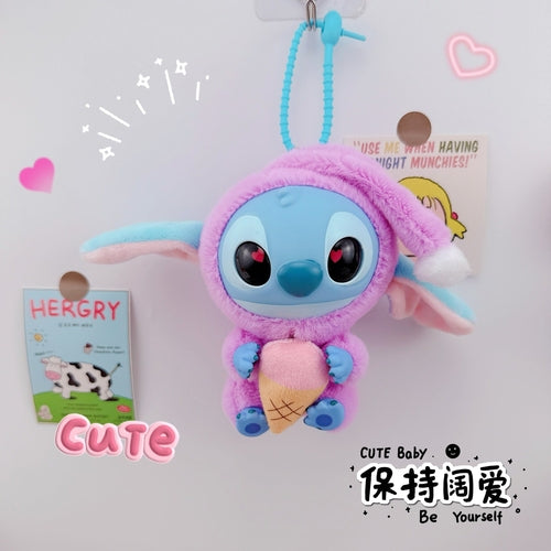 Vinyl Stitch Keychain Pendant from Rose Sand Brier featuring a sleepy design, made of colorful vinyl material.