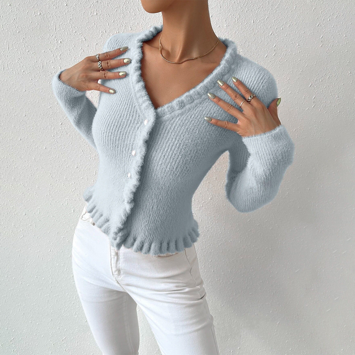 Carmine Juneberry Pearl Embrace Cardigan from Haute Edition 25, a cozy sweater with pearl details, shown in a front view.
