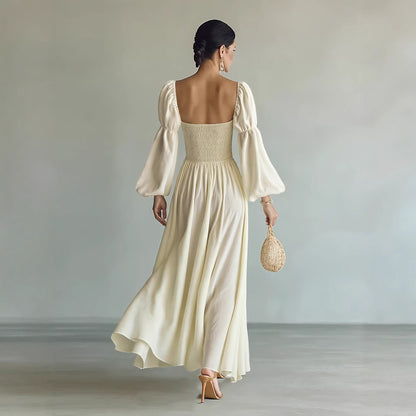 Women’s retro French-style formal dress with puff sleeves by Pear Daisy, elegant and artistic for special occasions.