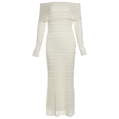 Elegant off-shoulder lace maxi dress by Carmine Juneberry featuring a flowing silhouette and intricate lace details.