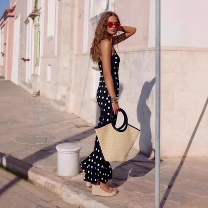 Polka dot printed summer dress by Pear Daisy featuring waist control, ruffles, and a sheath style for a stylish summer look.