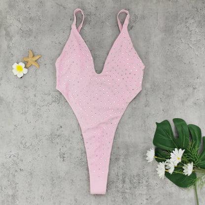 Pear Daisy backless one-piece swimsuit with T-shaped design and high slit, perfect for stylish beach or poolside wear.