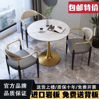A light luxury sintered stone small round table for reception and negotiation tables and chairs, a trendy coffee table, balcony lounge table, and chair combination