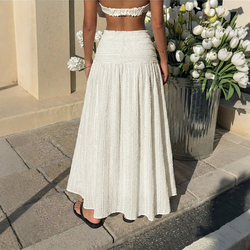 Pear Daisy Vacation large swing elastic waist solid color textured skirt, perfect for home and garden wear, shown in a natural fabric close-up.