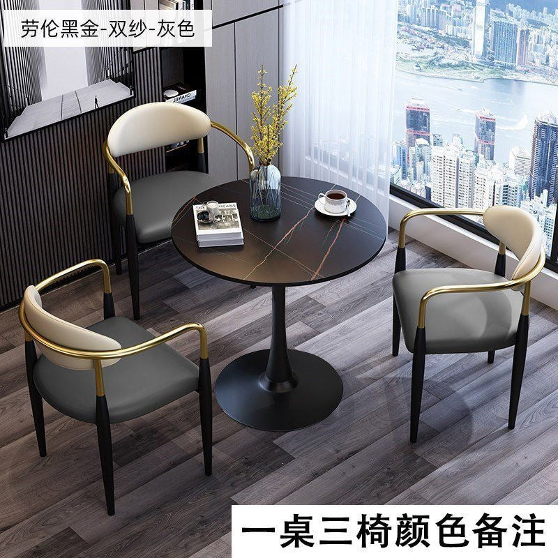 A light luxury sintered stone small round table for reception and negotiation tables and chairs, a trendy coffee table, balcony lounge table, and chair combination
