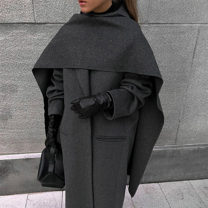 Carmine Juneberry Urban Drape Wool Coat, 25 Edition, stylish jacket with a tailored fit and classic wool fabric, displayed on a hanger.