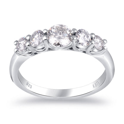 Sterling silver white moissanite 5-stone ring with elegant design, showcasing sparkling gemstones and a polished band.