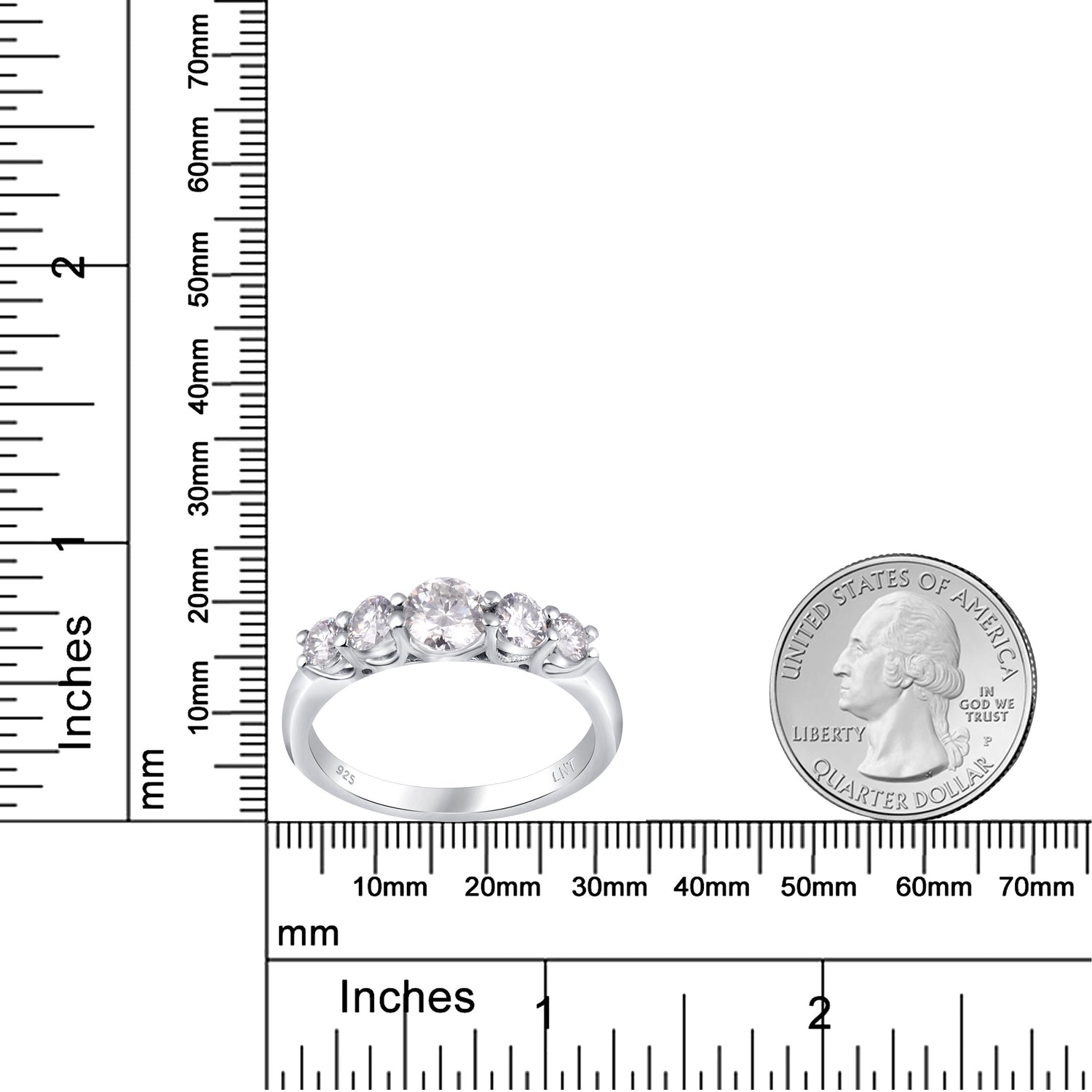 White moissanite 5-stone sterling silver ring from Copper Juniper, showcasing sparkling gemstones and elegant design.