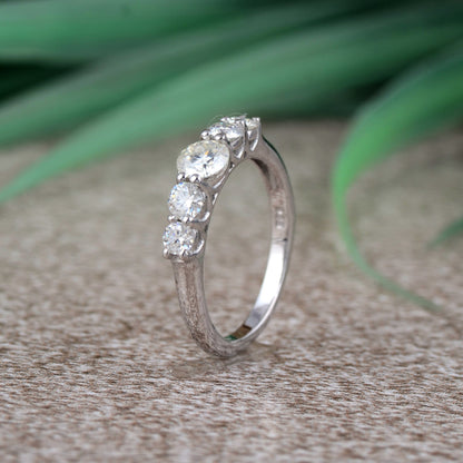 Sterling silver white moissanite 5-stone ring with sparkling gemstones, elegant jewelry piece from Copper Juniper