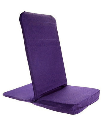 Purple OMSutra folding meditation chair by Alabaster, portable and comfortable for outdoor and indoor meditation sessions.