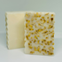 Bronze Alder oat, milk, and honey soap bar with creamy lather and natural ingredients, displayed on a neutral background.