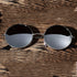 Vintage metal frame sunglasses by Teal Simba featuring classic design and dark tinted lenses.