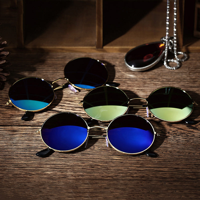 Vintage metal frame sunglasses by Teal Simba featuring classic design and tinted lenses.