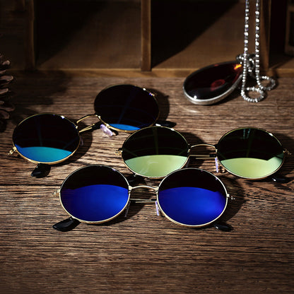Vintage metal frame sunglasses by Teal Simba featuring classic design and tinted lenses.