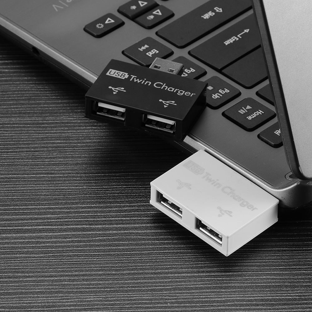 Teal Simba portable USB charger hub for bath and beauty devices, compact and lightweight for convenient charging.