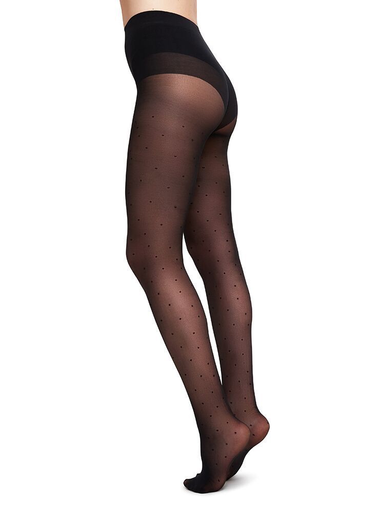 Semi-opaque black recycled polyamide plumetis tights by Silver Daedalus, showcasing delicate dotted pattern and smooth fit.