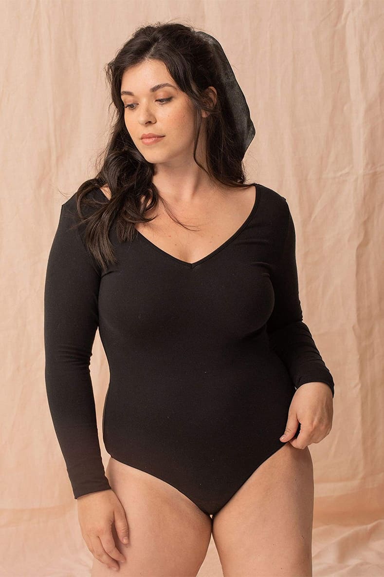 Black long-sleeve lingerie body by Silver Daedalus featuring delicate lace details and a fitted design.