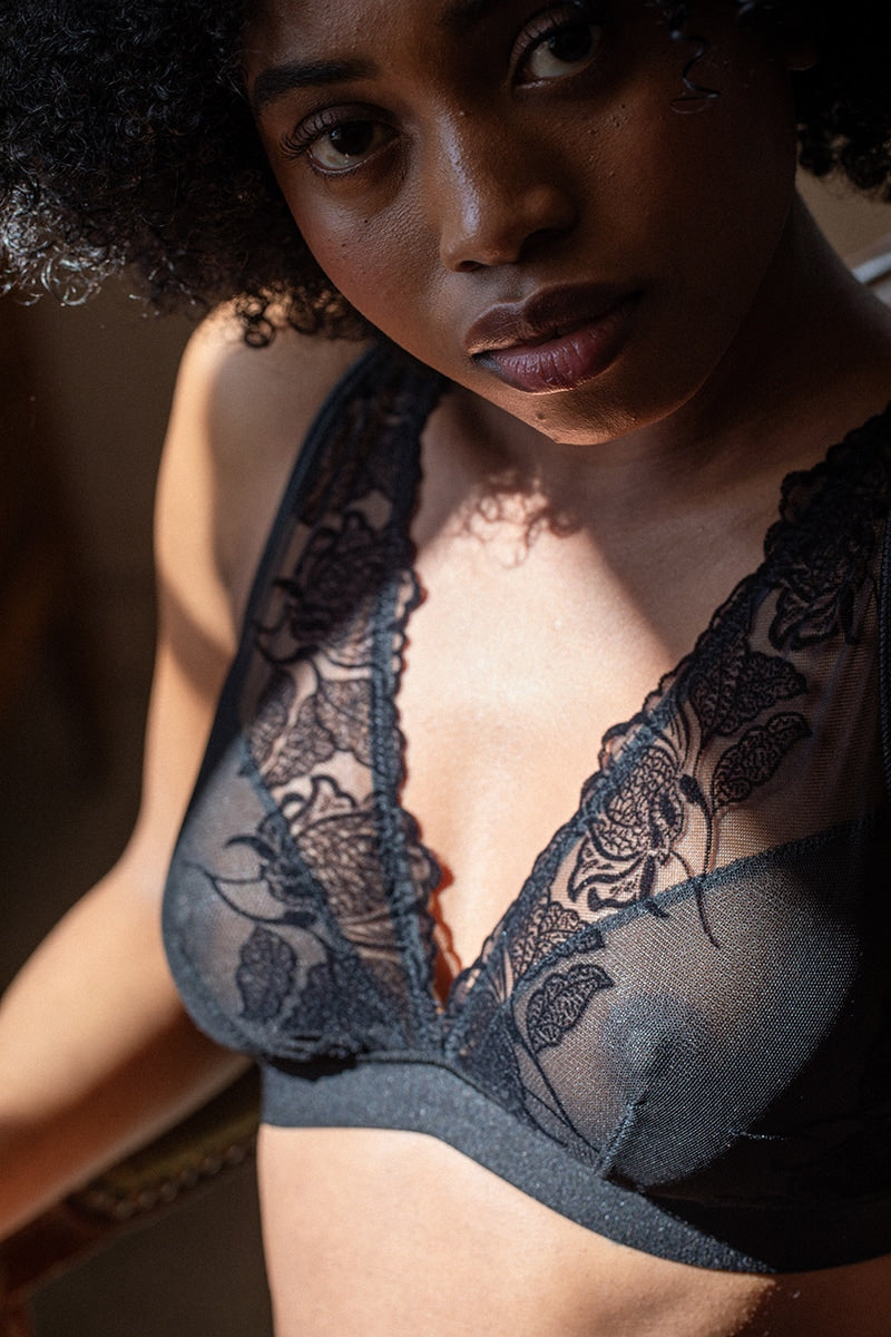 Black Neva foulard lingerie bra by Silver Daedalus featuring delicate lace and recycled fabric, displayed on a neutral background.