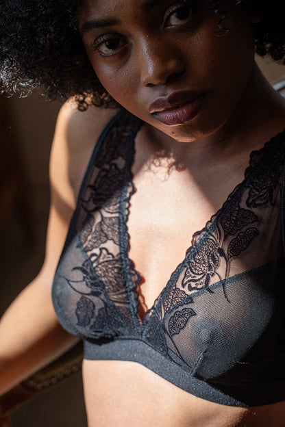 Black Neva foulard lingerie bra by Silver Daedalus featuring delicate lace and recycled fabric, displayed on a neutral background.