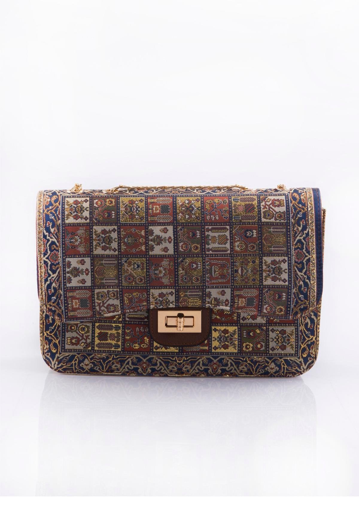 Blue mosaic handmade Oriental handbag by Chocolate Eros, featuring multicolor intricate patterns and elegant design.