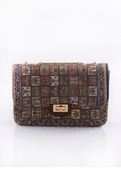 Blue mosaic handmade Oriental handbag by Chocolate Eros, featuring multicolor intricate patterns and elegant design.