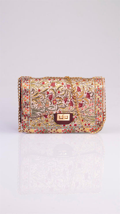 Colorful handmade Oriental handbag by Chocolate Eros featuring floral patterns, stylish design, and multicolor accents.