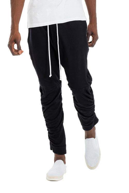 Lime Milo gathered cotton sweatpants, soft and comfortable pants with a relaxed fit, shown in black in the product image.