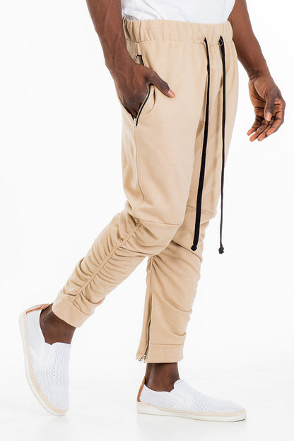 Lime Milo gathered cotton sweats pants in khaki, featuring a relaxed fit and soft fabric for comfortable casual wear.
