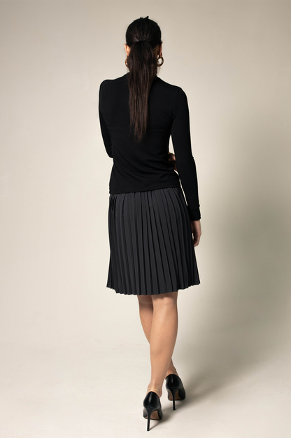 Elegant black pleated skirt by Mauve Daisy, stylish women&
