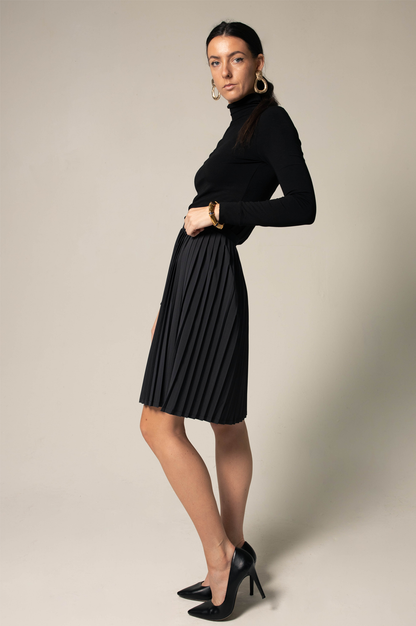 Elegant black pleated skirt for women by Mauve Daisy, showcasing a flowing, high-quality fabric with detailed pleats.