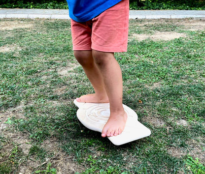 Red Oceanus Maze Wooden Balance Board, a versatile wooden furniture piece with a smooth finish and modern design.