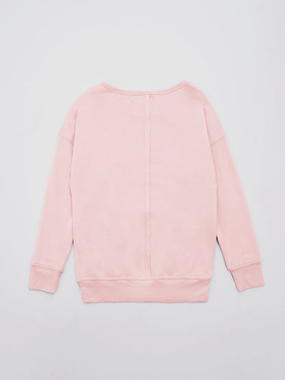 Pink crewneck sweatshirt for kids from Salmon Eros with exposed back design, comfortable and stylish kid&
