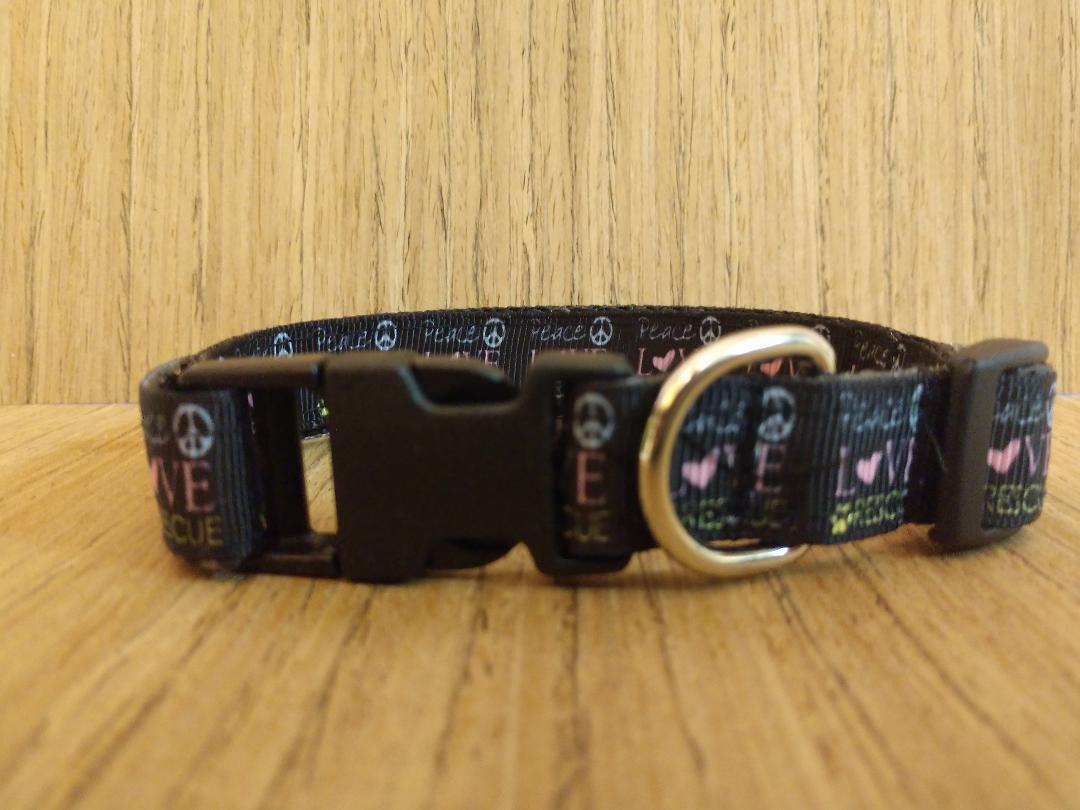 Small Green Thalassa Peace Love and Rescue collar for pets, featuring colorful design and adjustable fit.