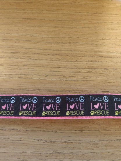 Large pink collar from Green Thalassa featuring Peace Love and Rescue design, suitable for pets.