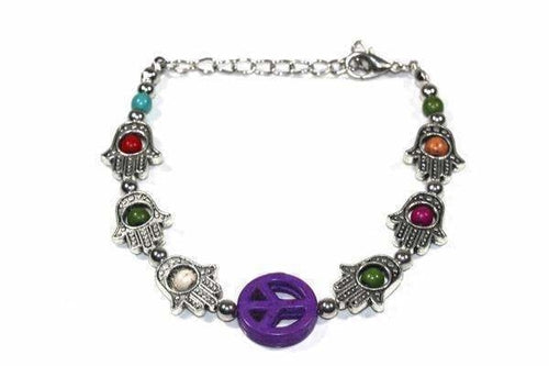 Purple Peace bracelet featuring Hamsa hand and peace symbols by Silver Hestia, made of silver with intricate design details.
