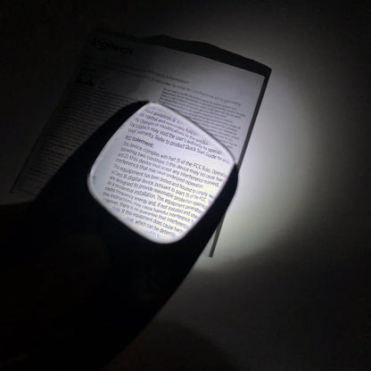 Byzantium Eleusis Pocket Zoom™ Recharge mini magnifier with LED light showing compact design and built-in illumination.