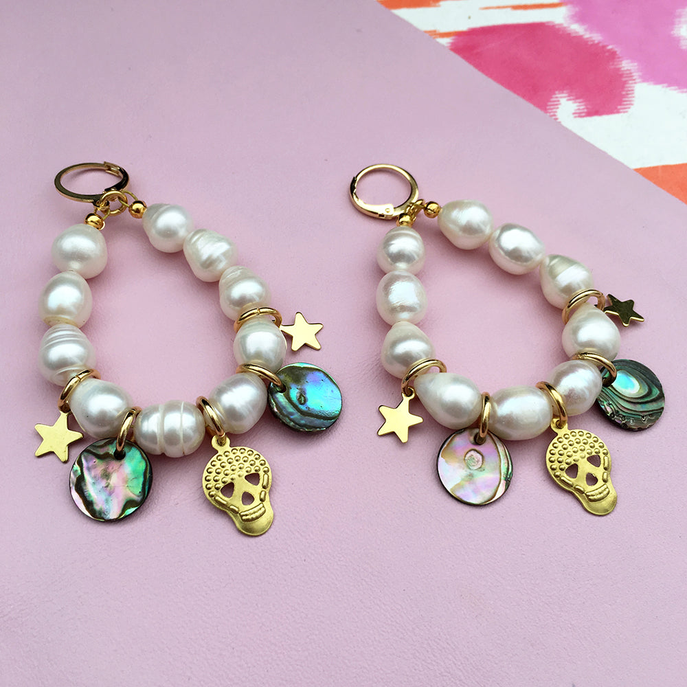 Pink pearl charm earrings by Yellow Athena with delicate pearl accents and silver hooks, stylish and elegant for everyday wear.